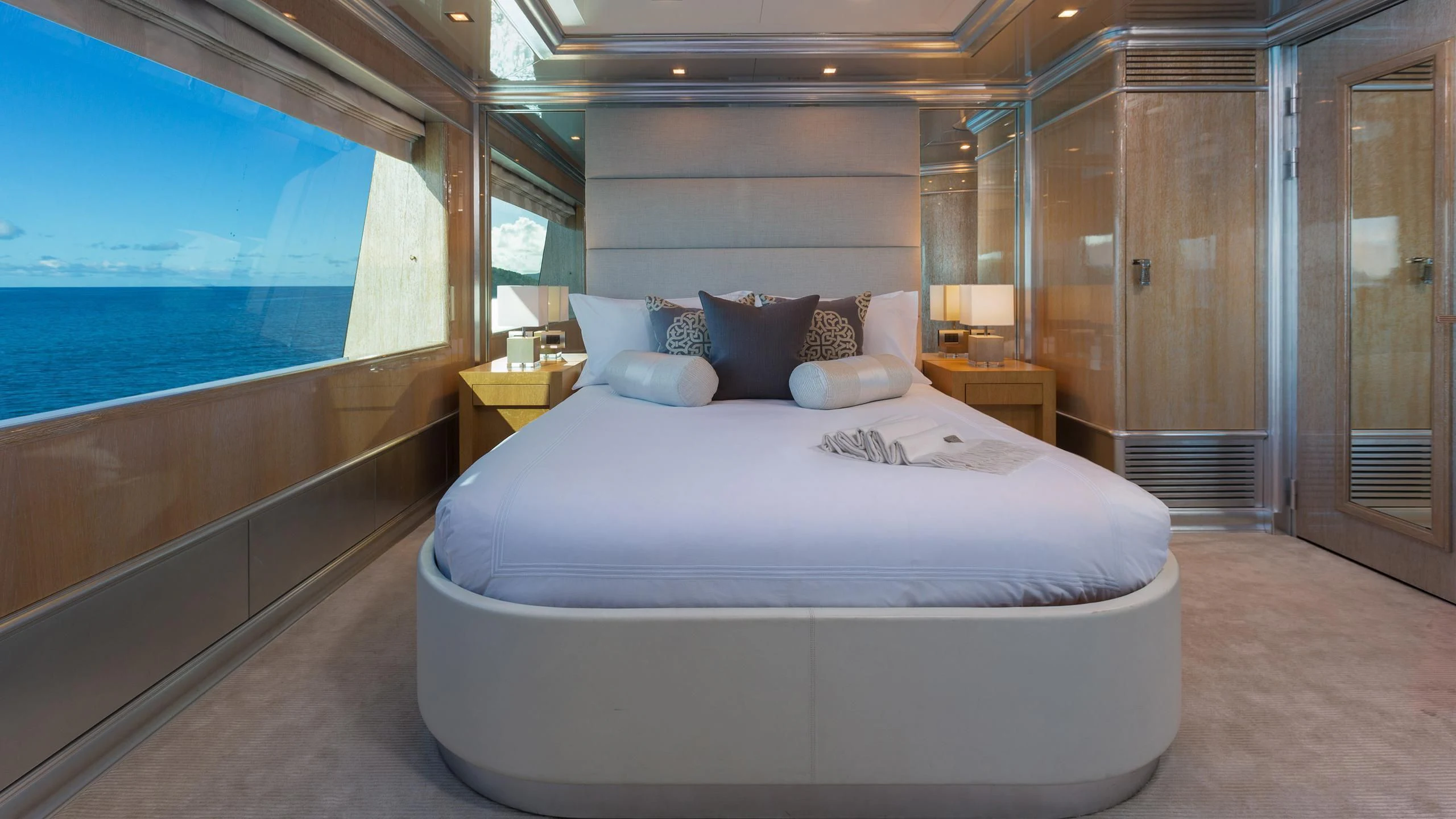 a bed in a room aboard ANDIAMO Yacht for Sale