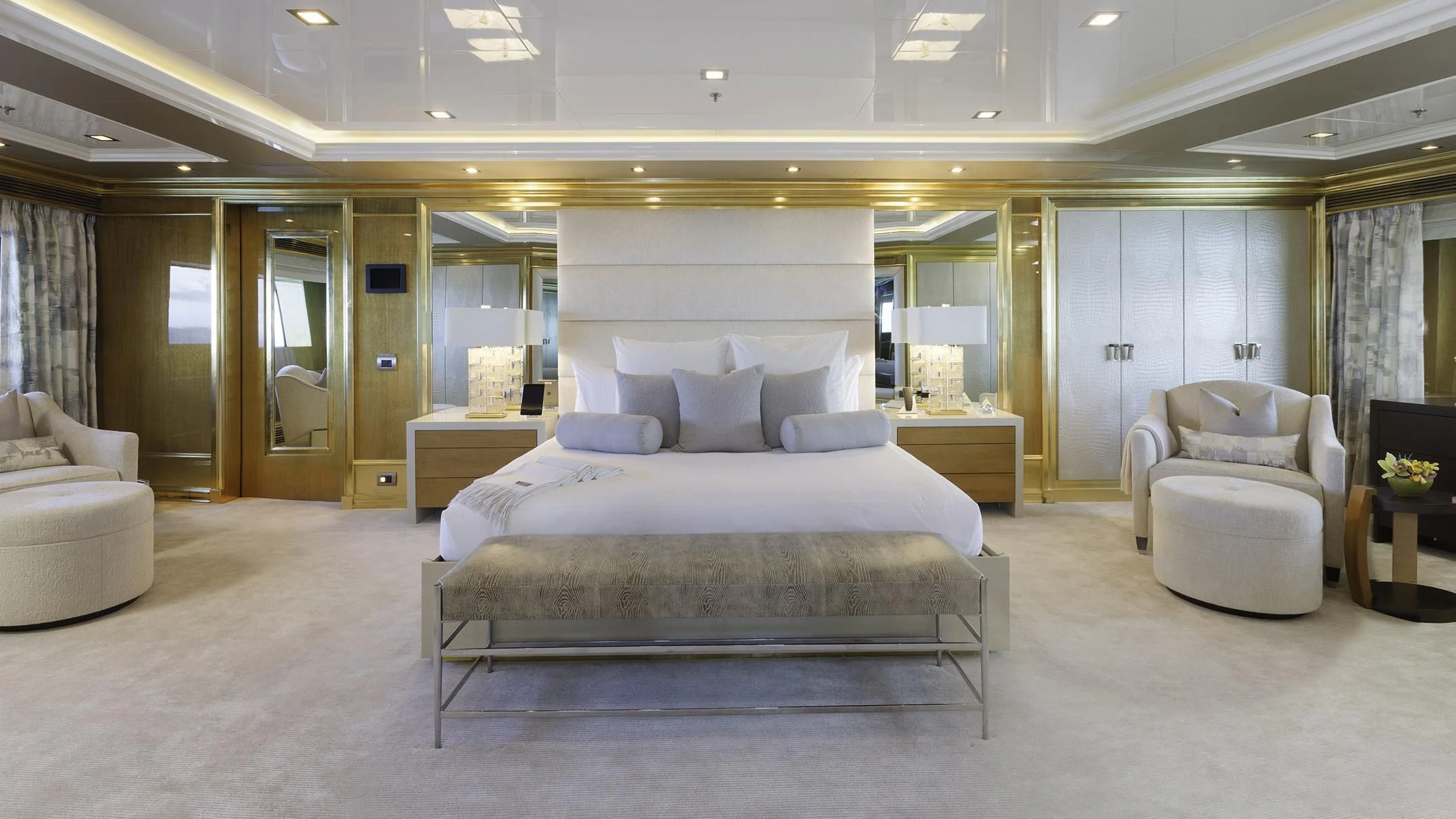 a large bedroom with a bed aboard ANDIAMO Yacht for Sale