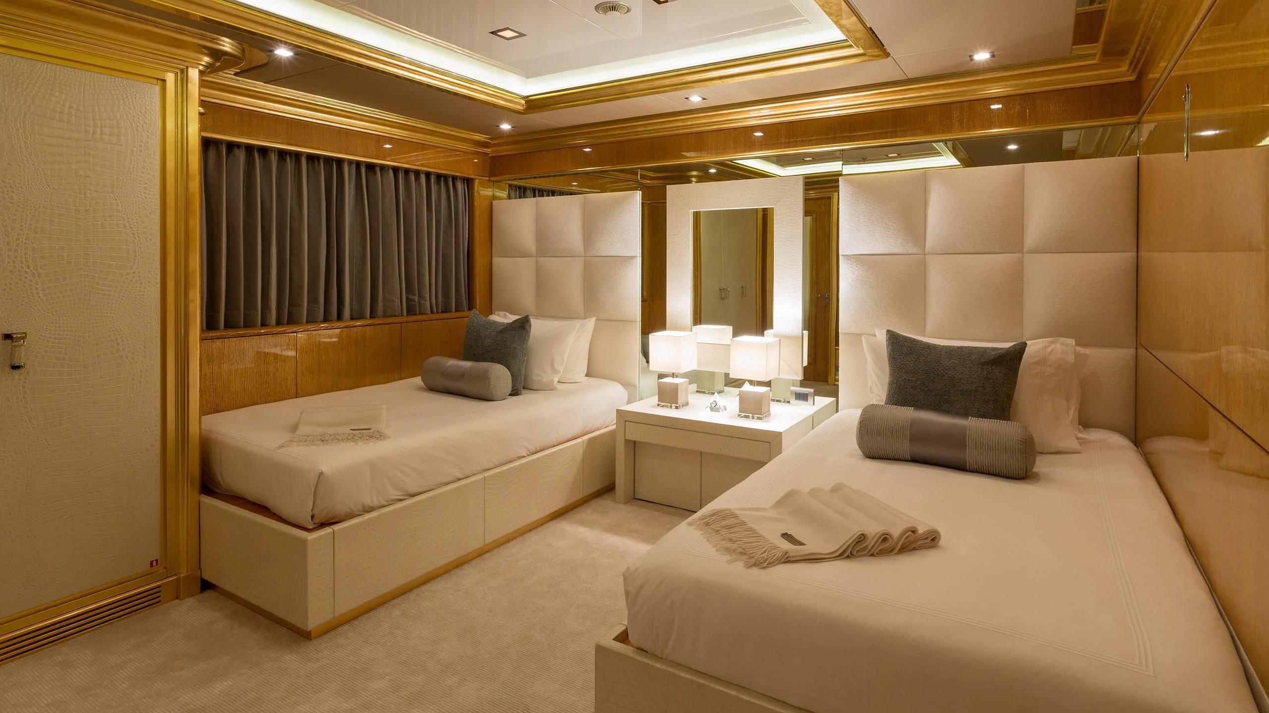 a hotel room with two beds aboard ANDIAMO Yacht for Sale
