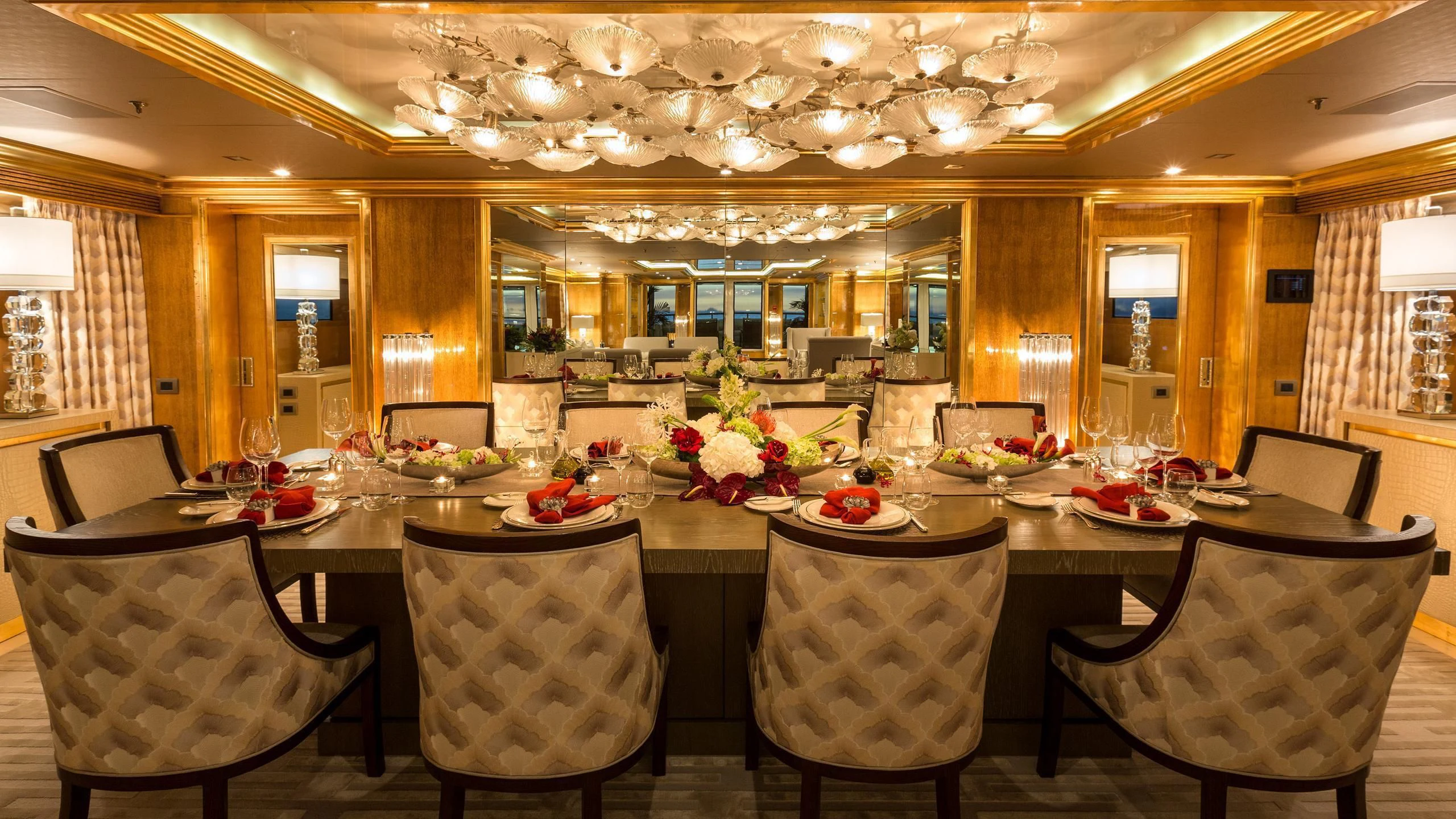 a large dining room with tables and chairs aboard ANDIAMO Yacht for Sale
