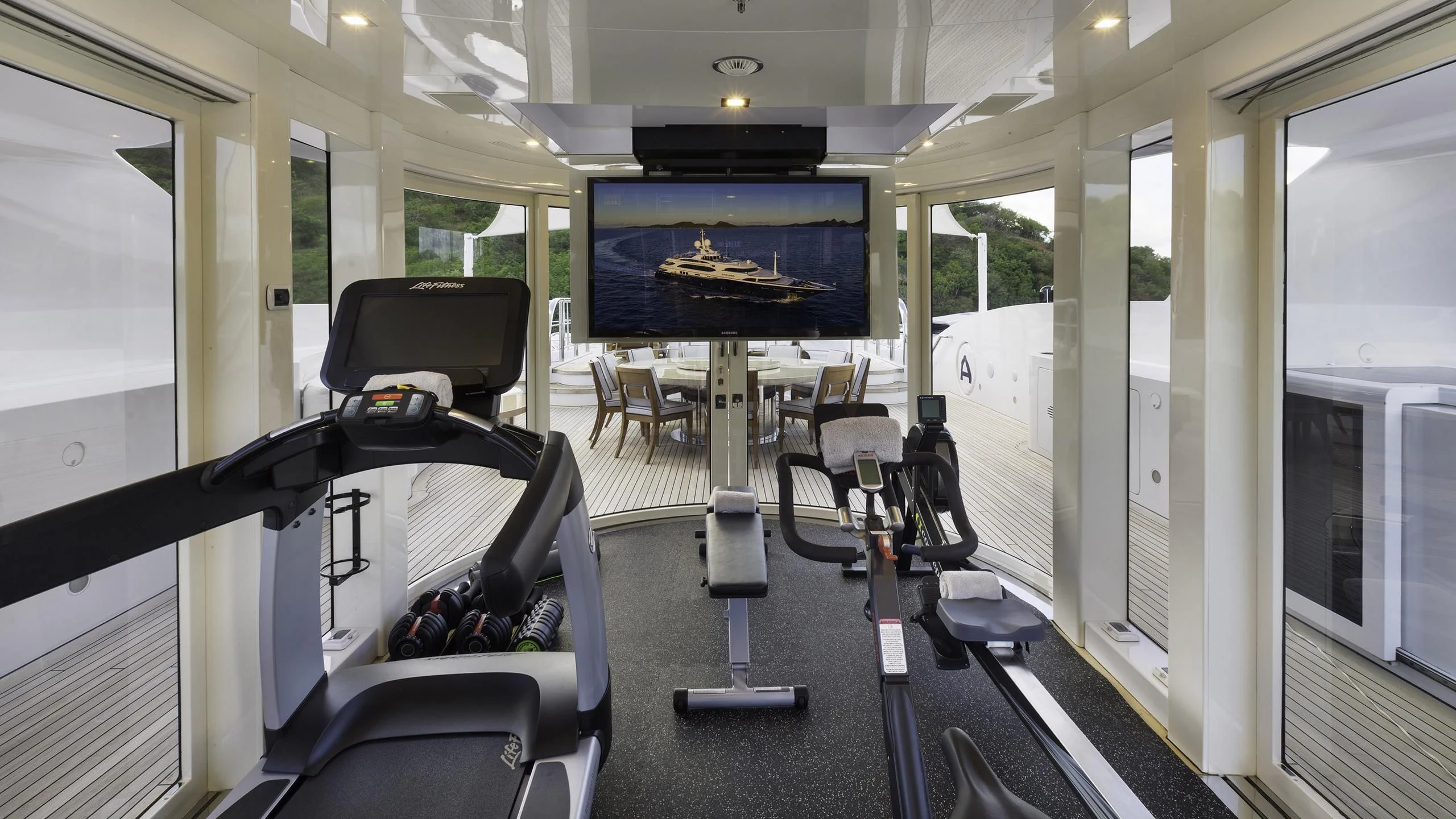 a room with a large screen aboard ANDIAMO Yacht for Sale