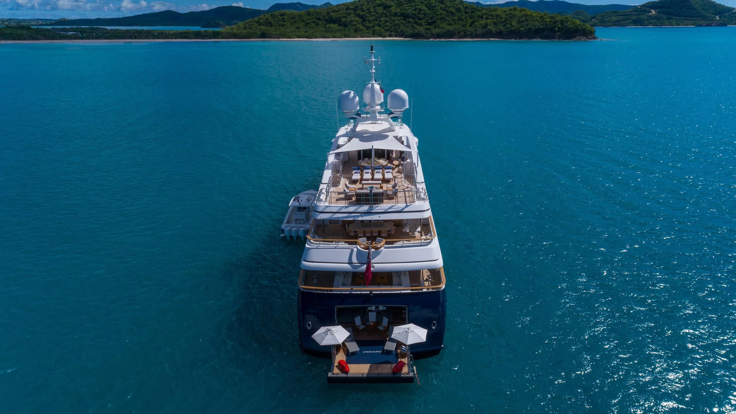 a large ship in the water aboard ANDIAMO Yacht for Sale