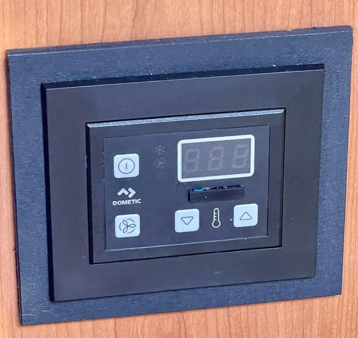 a black rectangular electronic device aboard ANDIAMO Yacht for Sale