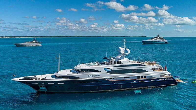 a large yacht in the water aboard ANDIAMO Yacht for Sale