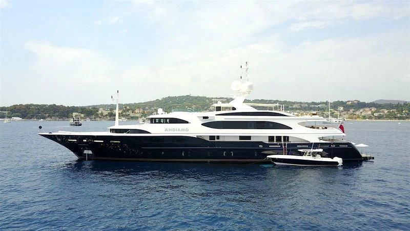 a large white yacht in the water aboard ANDIAMO Yacht for Sale