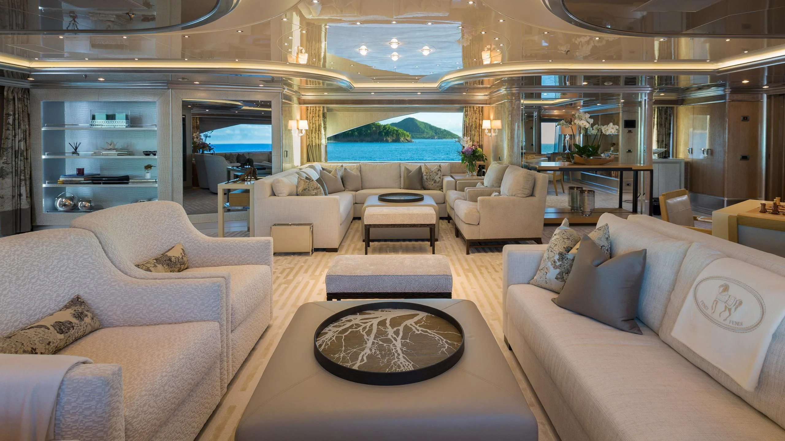 a living room with a large swimming pool aboard ANDIAMO Yacht for Sale
