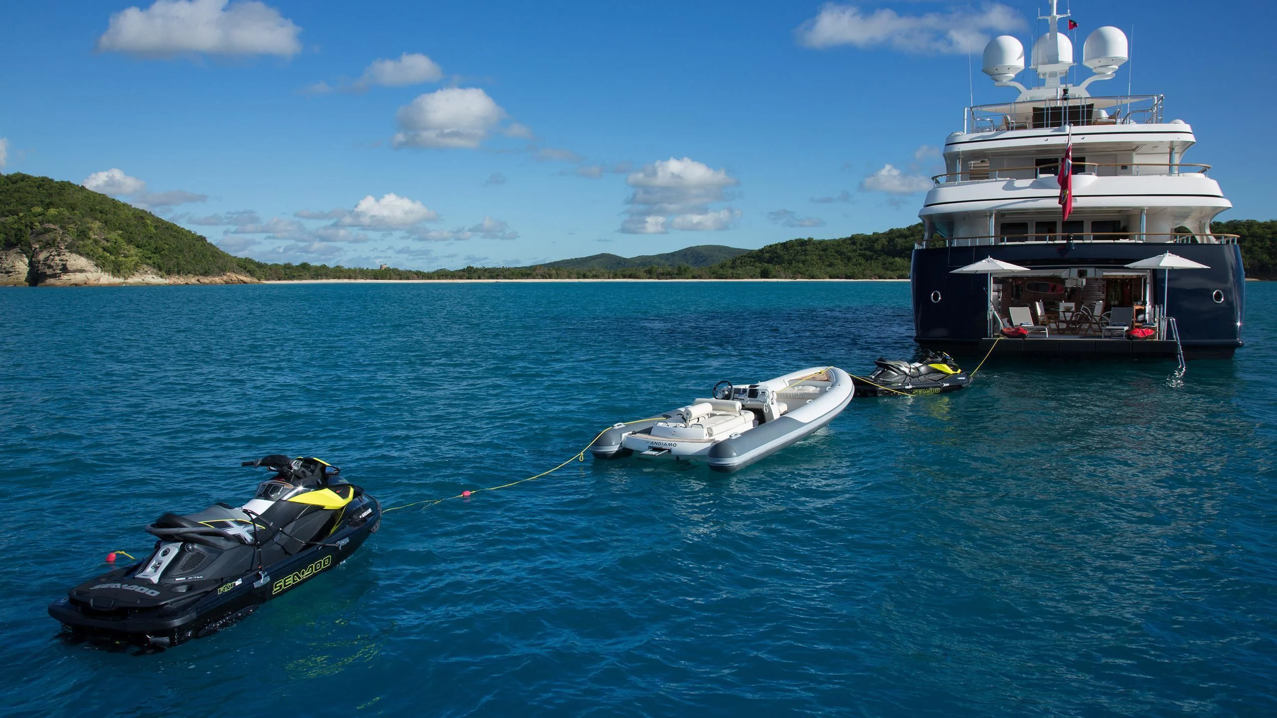 a boat and a boat in the water aboard ANDIAMO Yacht for Sale