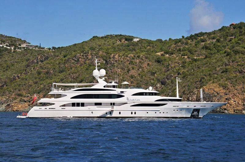 a white yacht on the water aboard ANDIAMO Yacht for Sale