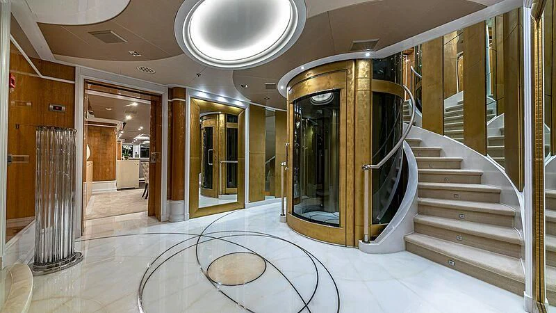 a hallway with glass doors aboard ANDIAMO Yacht for Sale