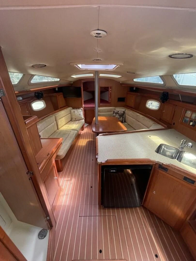 a kitchen with a large island aboard ANDIAMO Yacht for Sale
