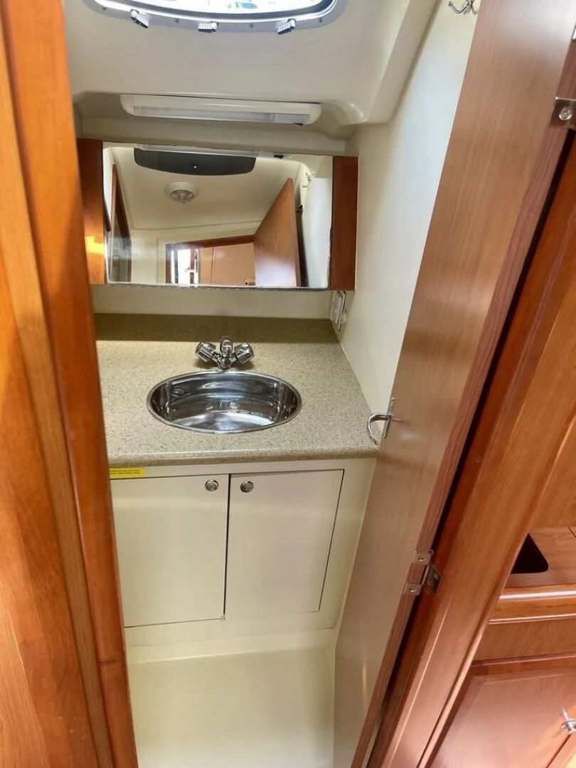 a bathroom with a marble counter top aboard ANDIAMO Yacht for Sale