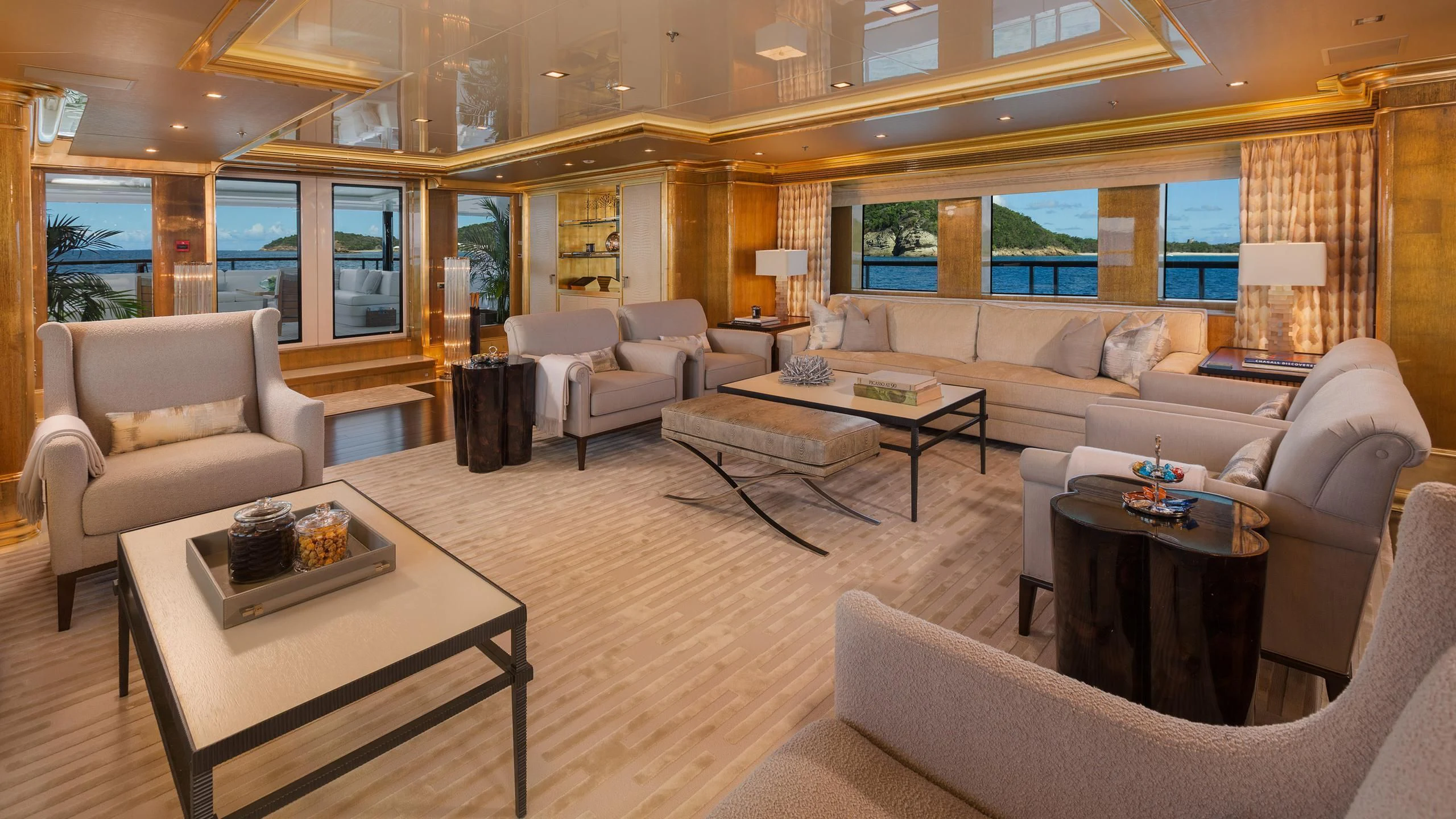 a living room with a large window aboard ANDIAMO Yacht for Sale