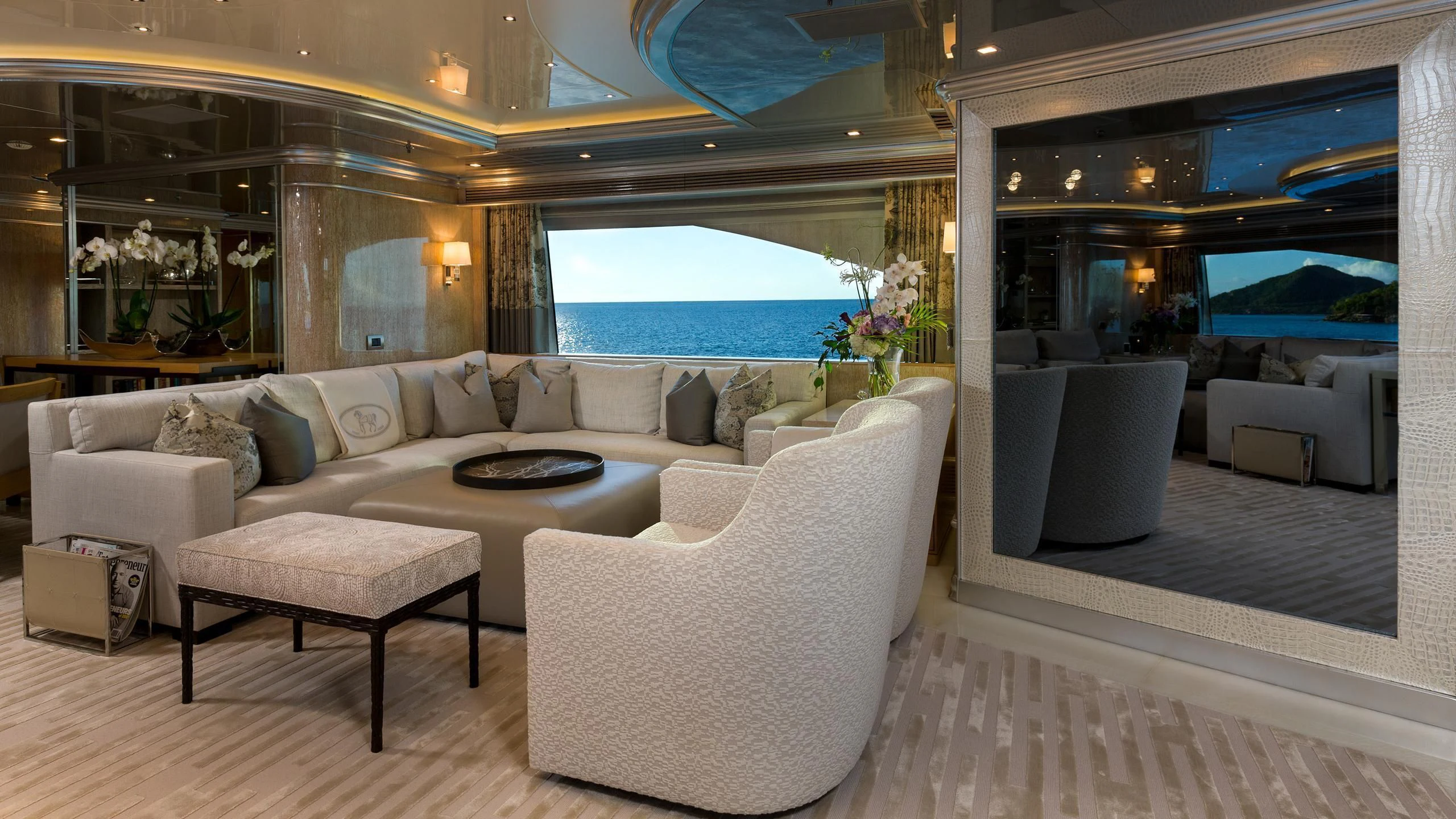 a living room with a large window aboard ANDIAMO Yacht for Sale