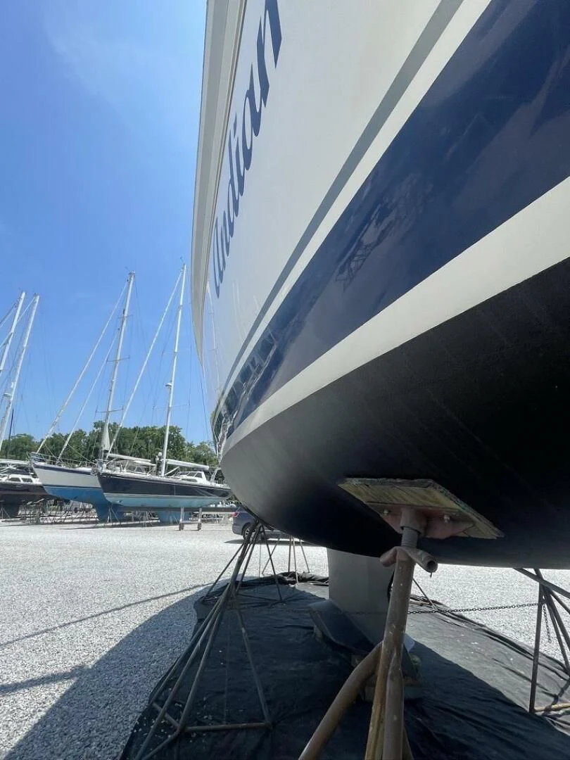 a boat docked at a pier aboard ANDIAMO Yacht for Sale