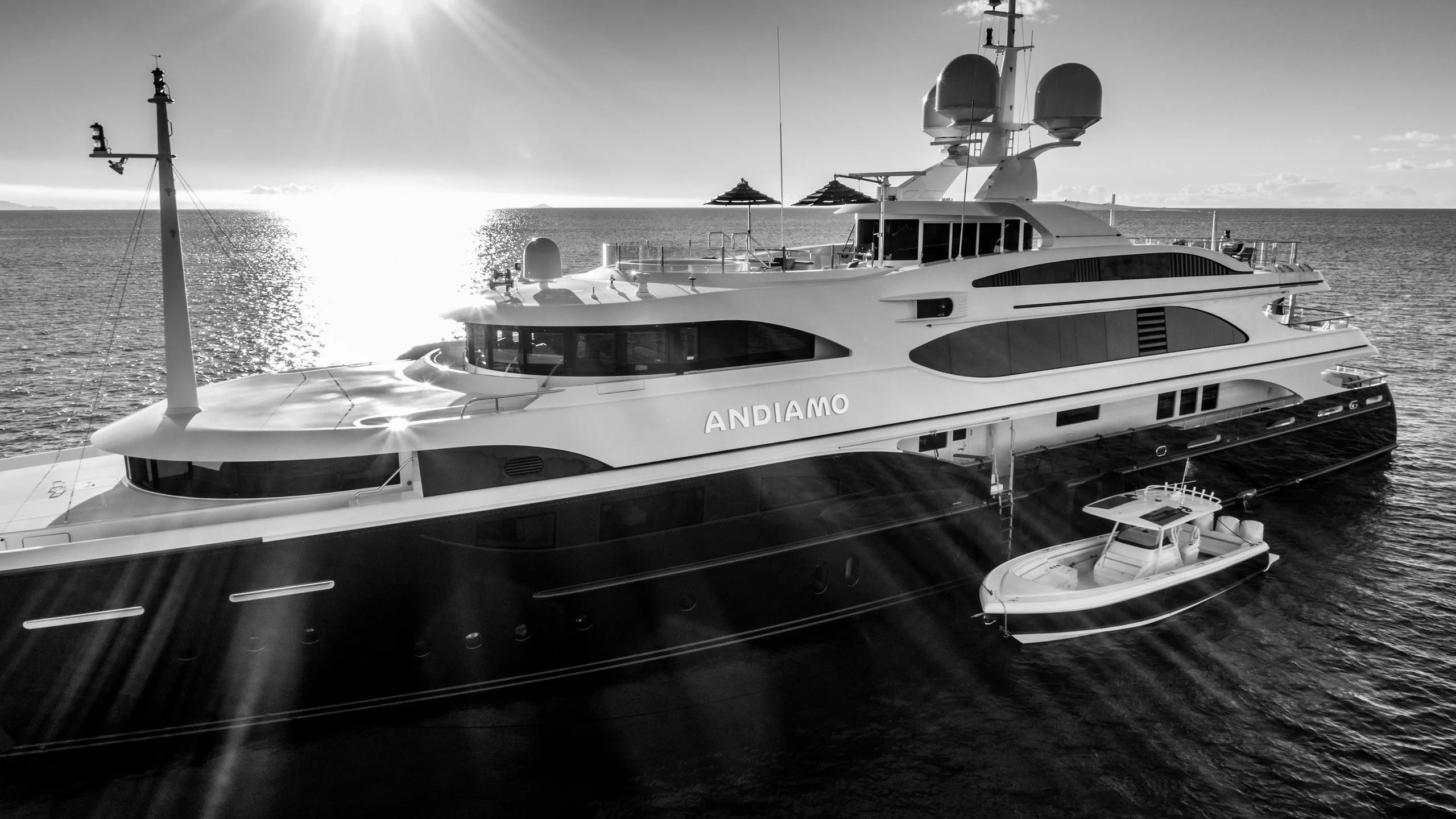 a black and white photo of a boat on the water aboard ANDIAMO Yacht for Sale