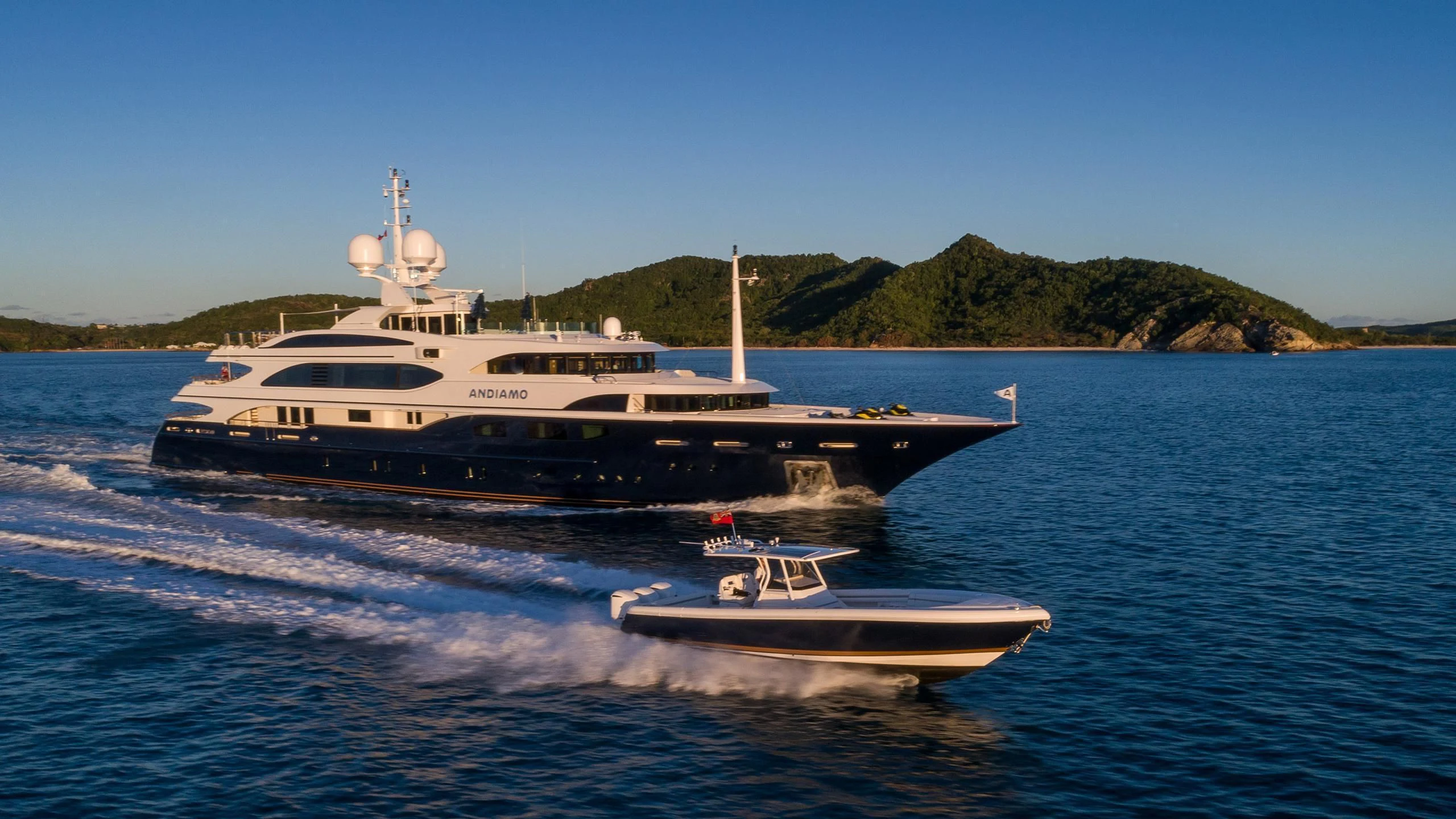 a boat and a boat in the water aboard ANDIAMO Yacht for Sale