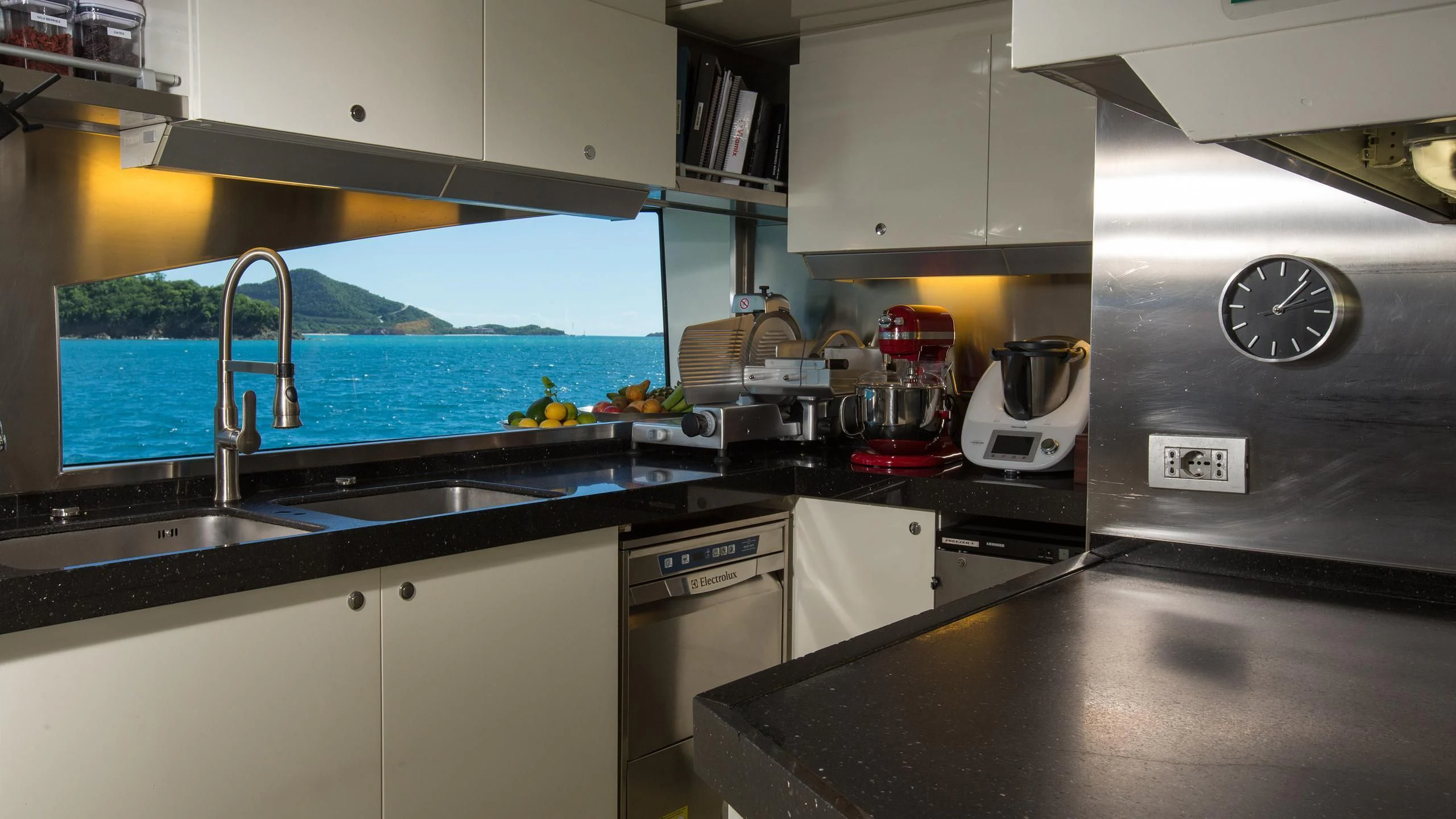 a kitchen with a sink and a window aboard ANDIAMO Yacht for Sale