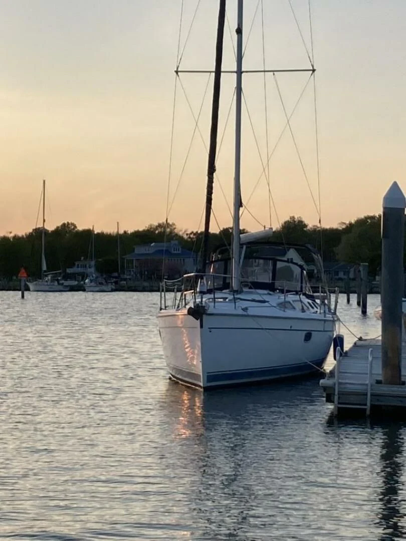 a boat docked at a pier aboard ANDIAMO Yacht for Sale
