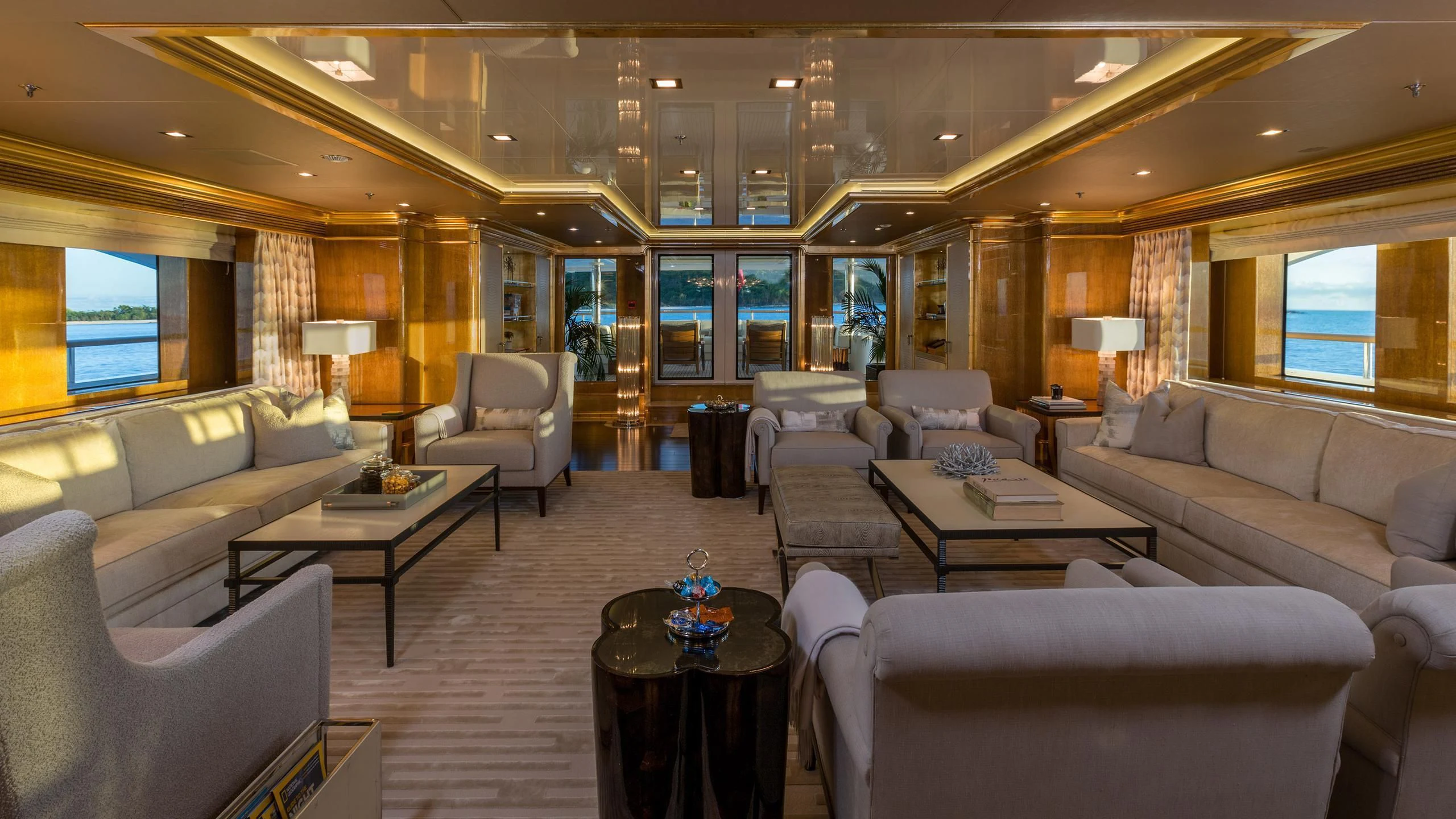 a living room with a large window aboard ANDIAMO Yacht for Sale