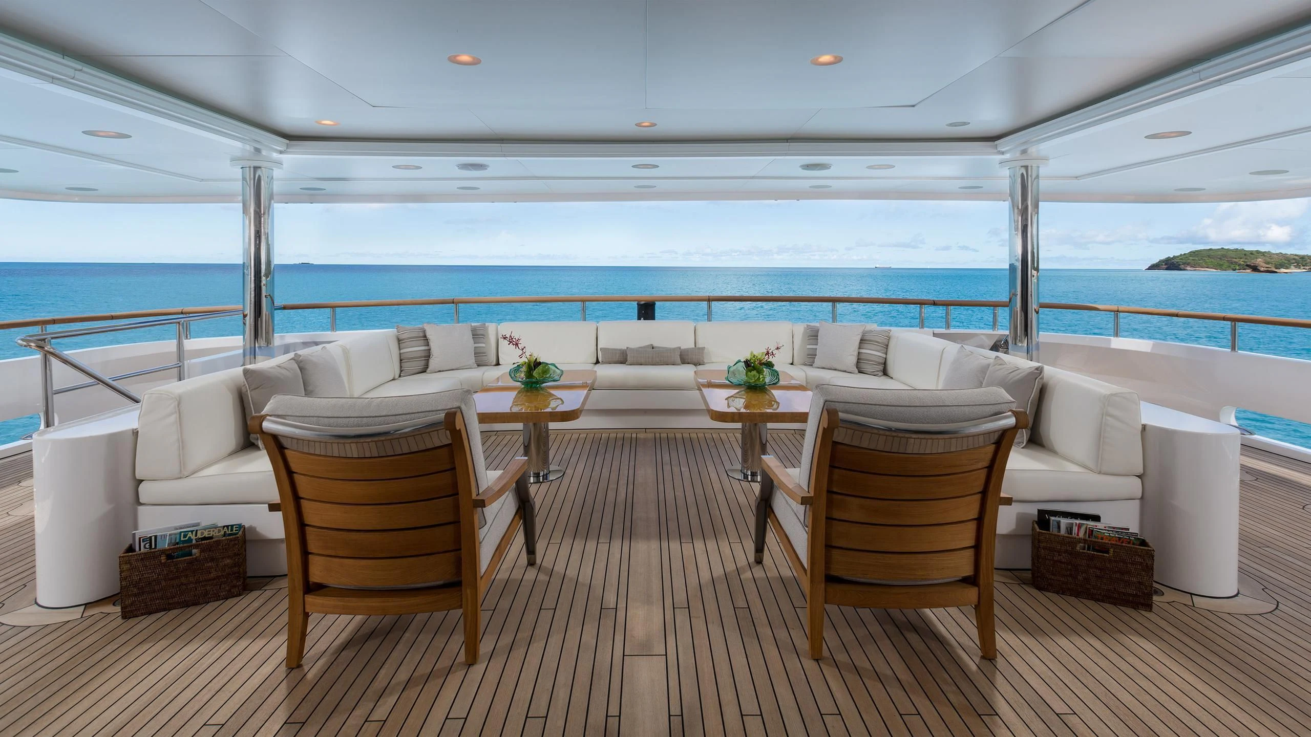 a room with a couch and chairs aboard ANDIAMO Yacht for Sale