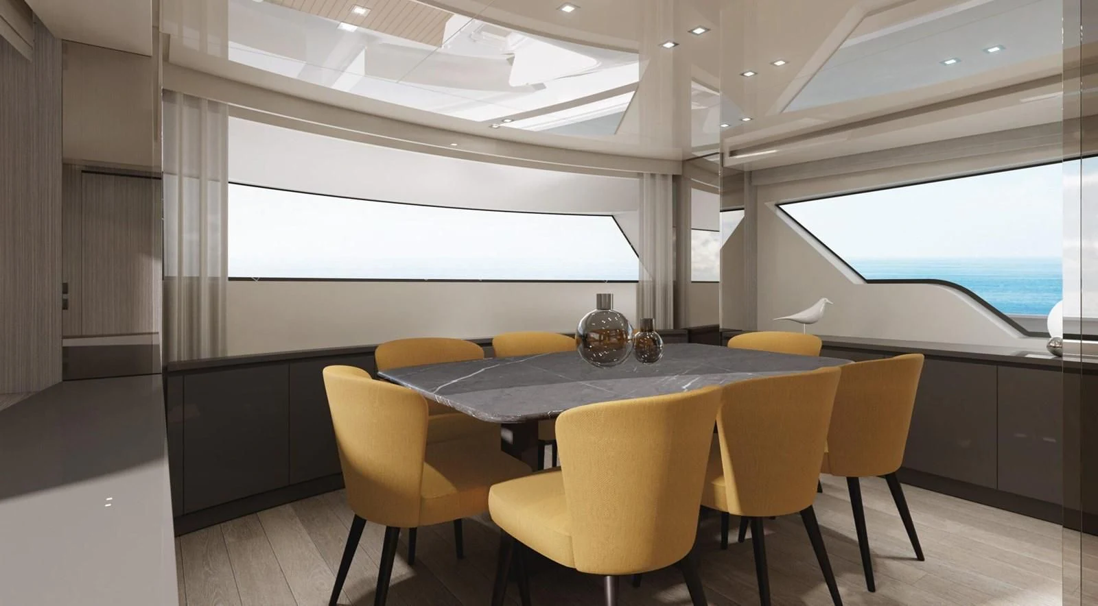 a table with chairs around it aboard 2020 SANLORENZO SX88 #43 Yacht for Sale