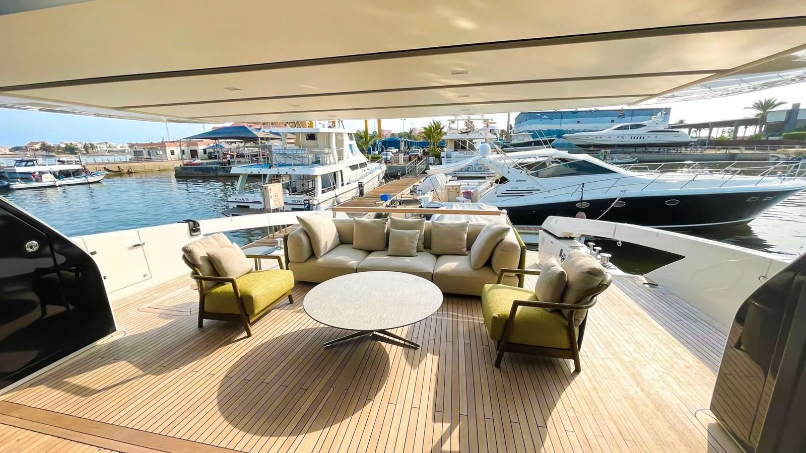 a room with a couch and chairs aboard 2020 SANLORENZO SX88 #43 Yacht for Sale