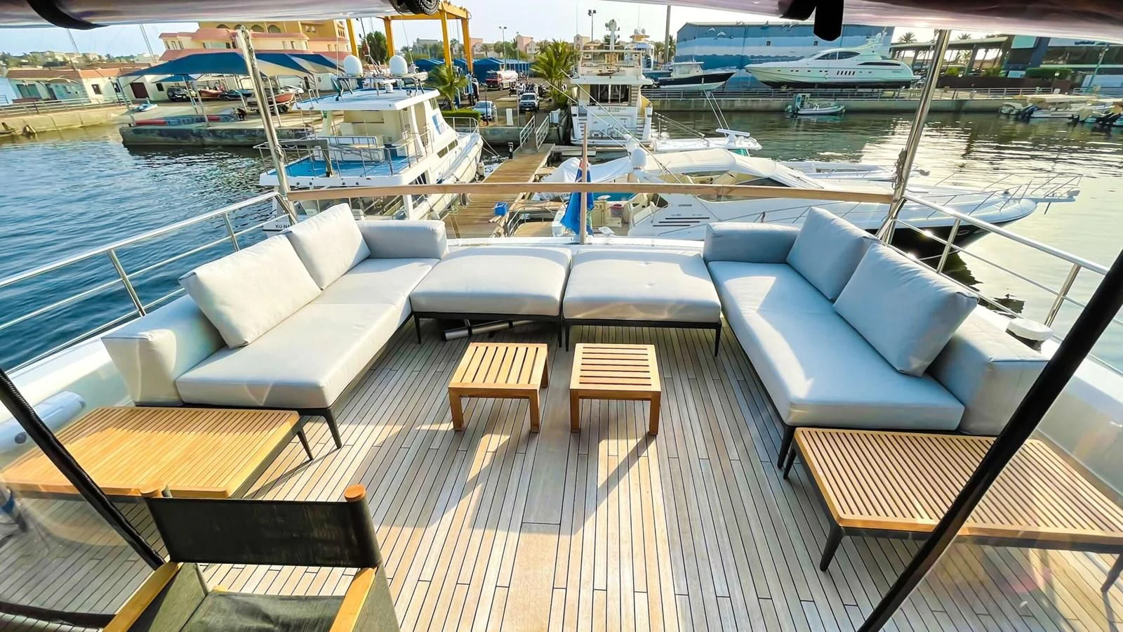 a deck with a boat and a bench on it aboard 2020 SANLORENZO SX88 #43 Yacht for Sale