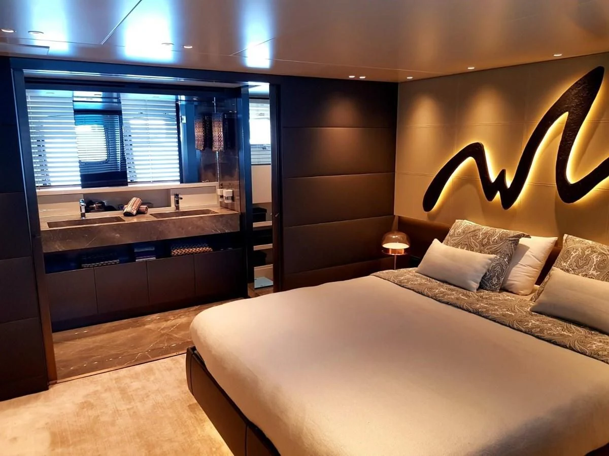 a hotel room with a large bed aboard 2020 SANLORENZO SX88 #43 Yacht for Sale