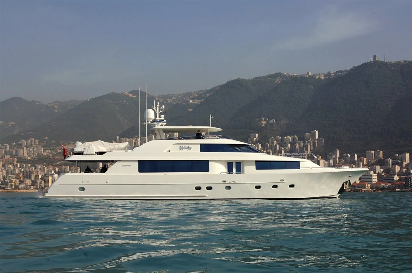 a white yacht in the water aboard HATATY Yacht for Sale