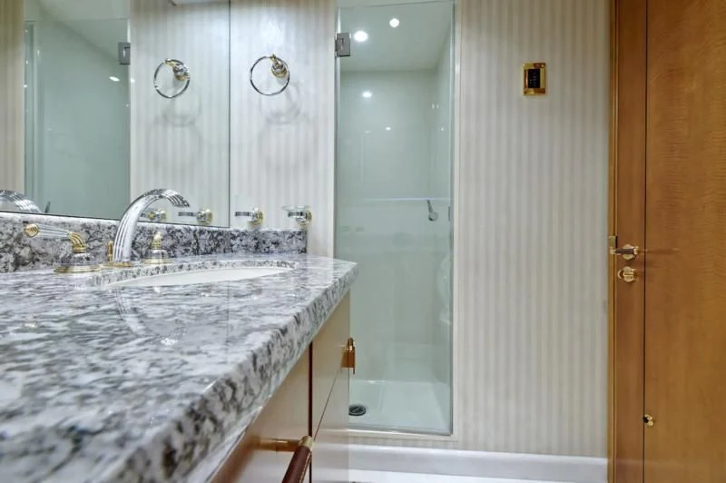 a bathroom with a marble counter top aboard HATATY Yacht for Sale
