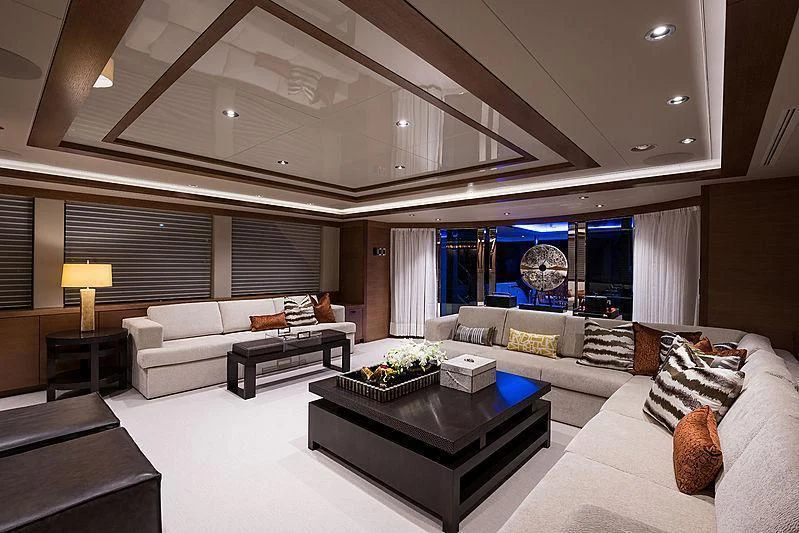 a living room with a large window aboard HAT TRICK Yacht for Sale