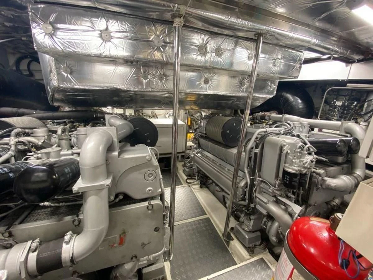 a car with a large engine aboard PERSHING 72 Yacht for Sale