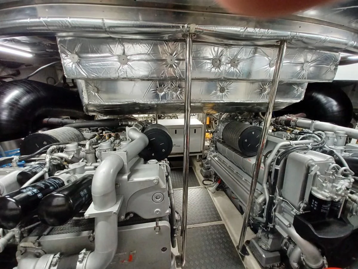 a car engine with a large amount of engine parts aboard PERSHING 72 Yacht for Sale