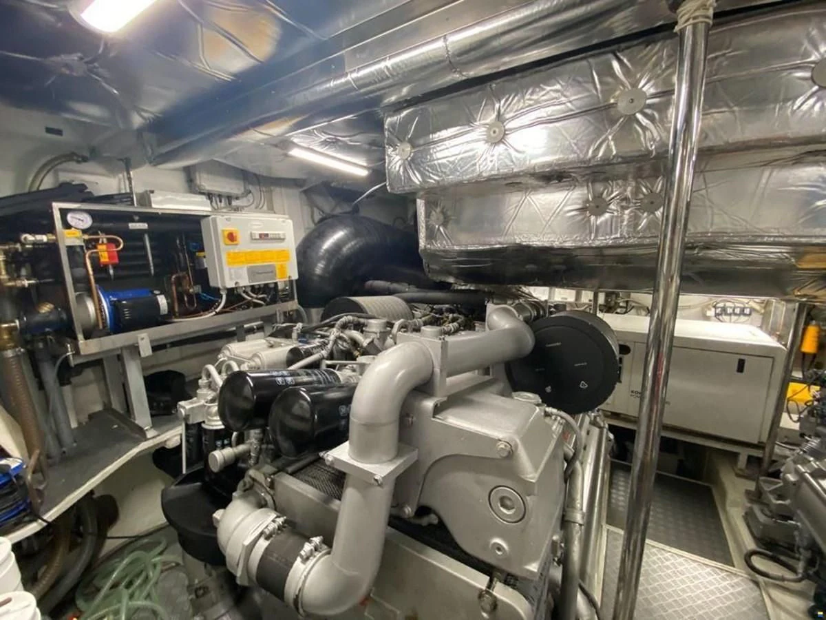 a large machine in a factory aboard PERSHING 72 Yacht for Sale