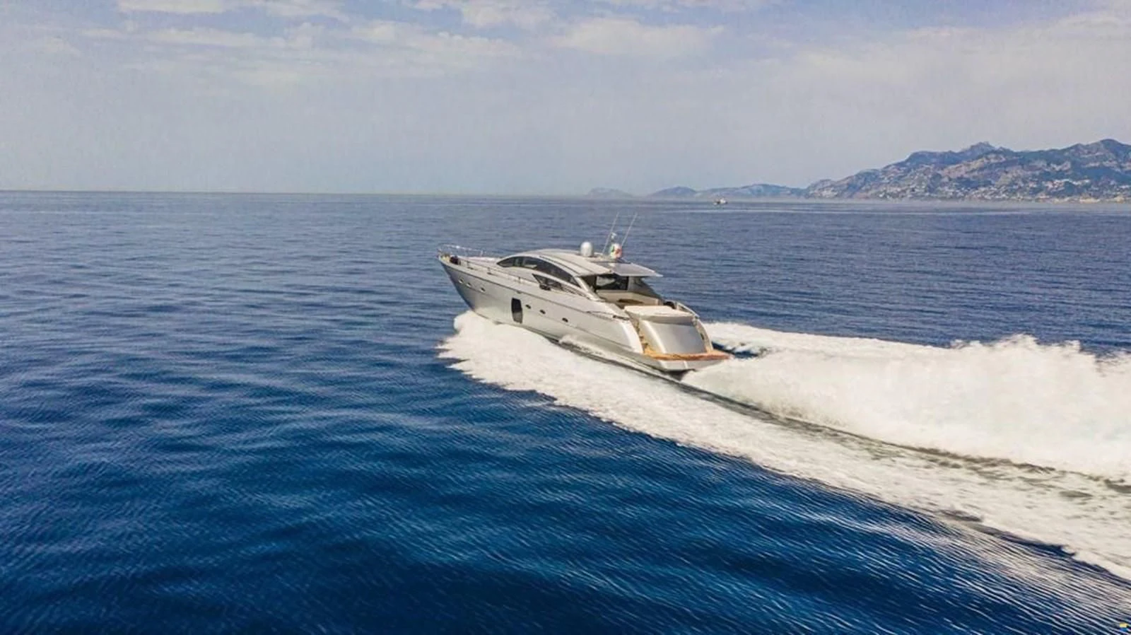 a boat on the water aboard PERSHING 72 Yacht for Sale