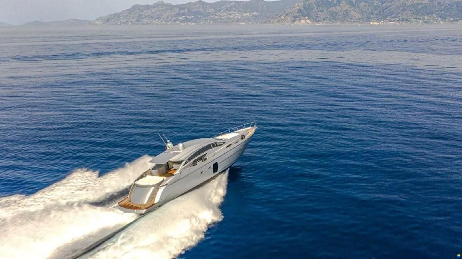 a boat on the water aboard PERSHING 72 Yacht for Sale