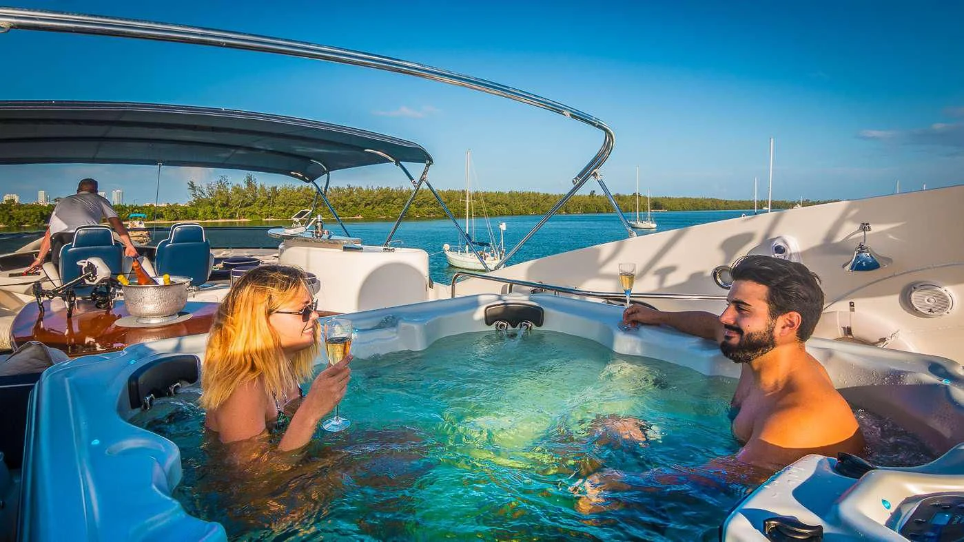 a group of people in a pool aboard SS ARTS Yacht for Sale