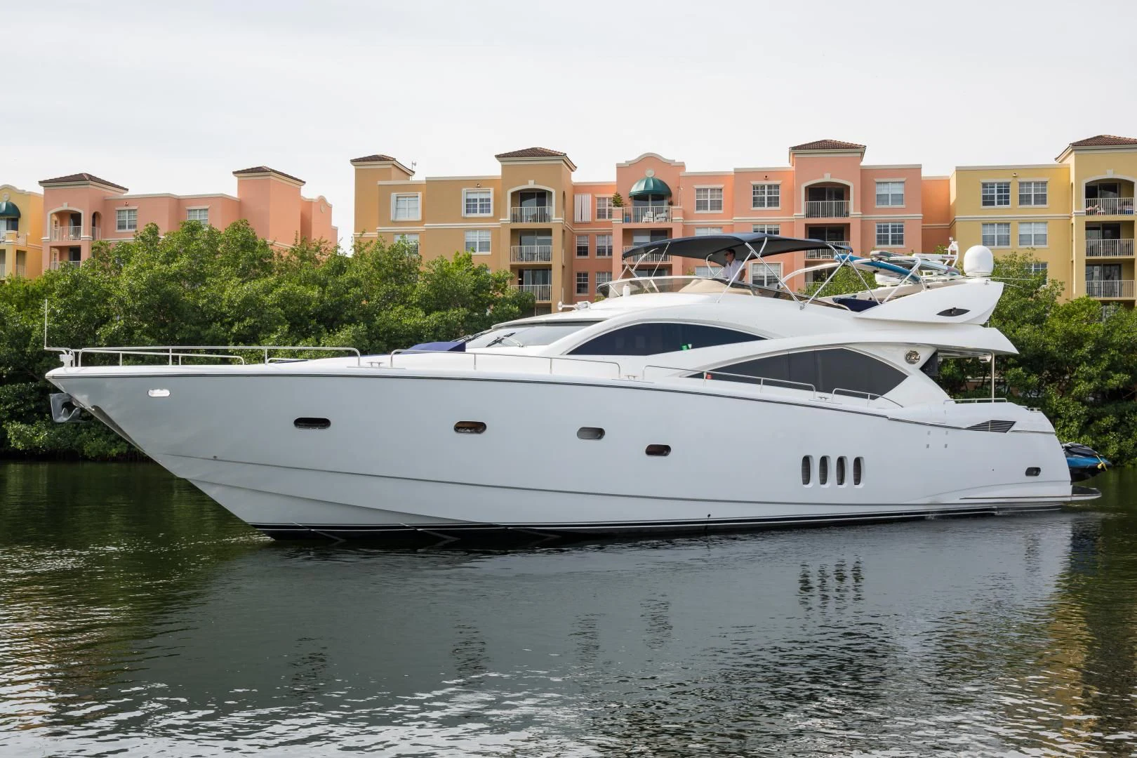a white yacht on water aboard SS ARTS Yacht for Sale