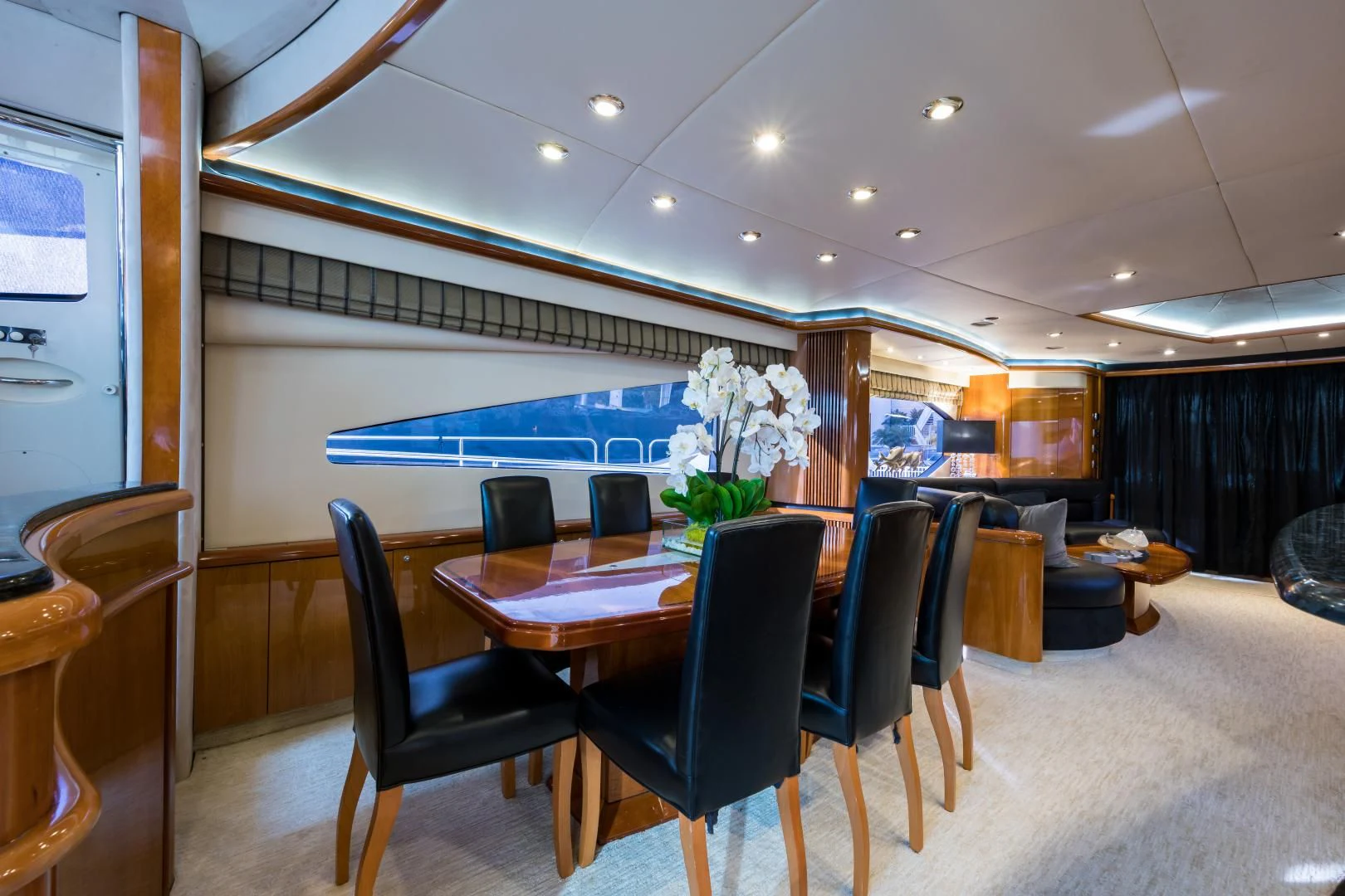 a room with a table and chairs aboard SS ARTS Yacht for Sale