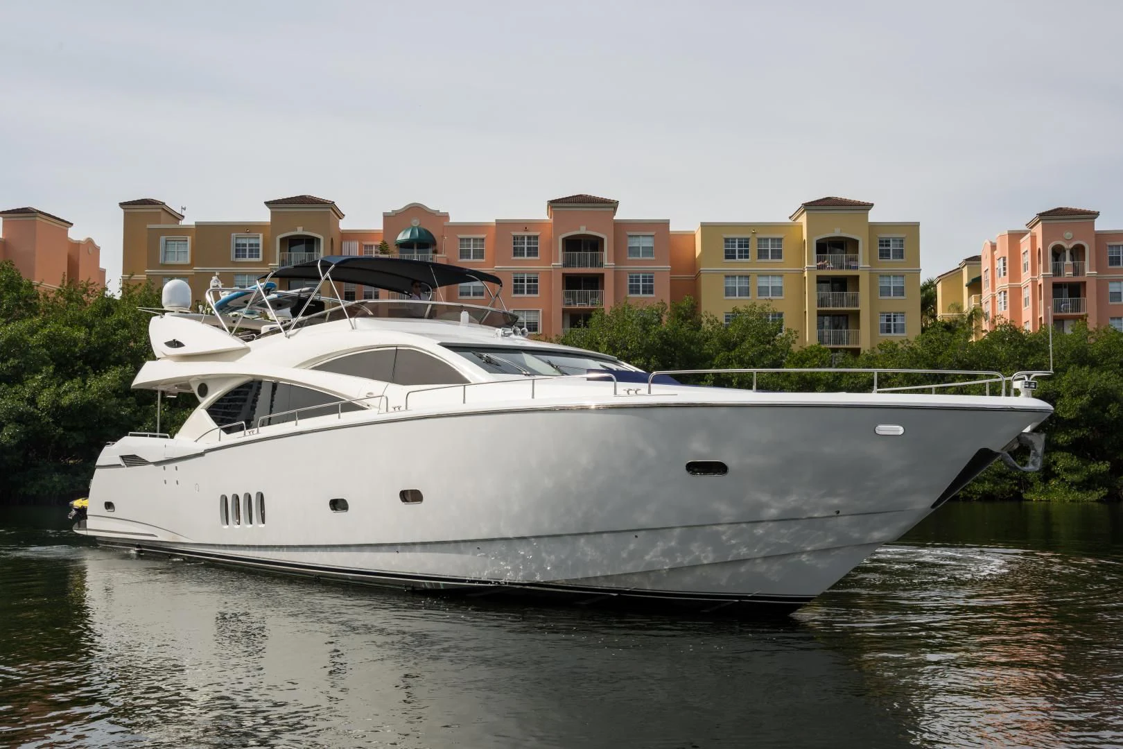a white boat on water aboard SS ARTS Yacht for Sale