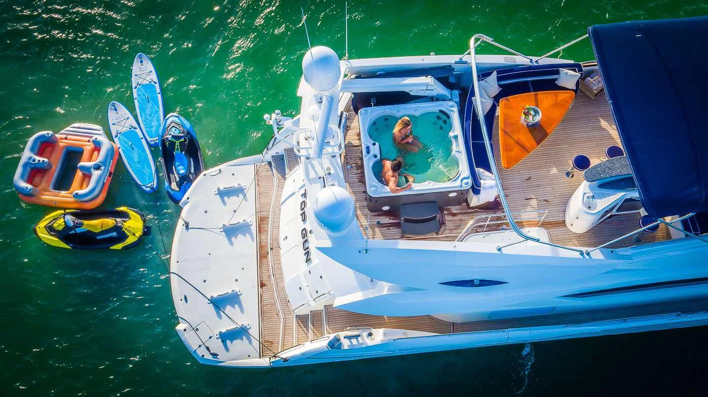 a person sits in a boat aboard SS ARTS Yacht for Sale
