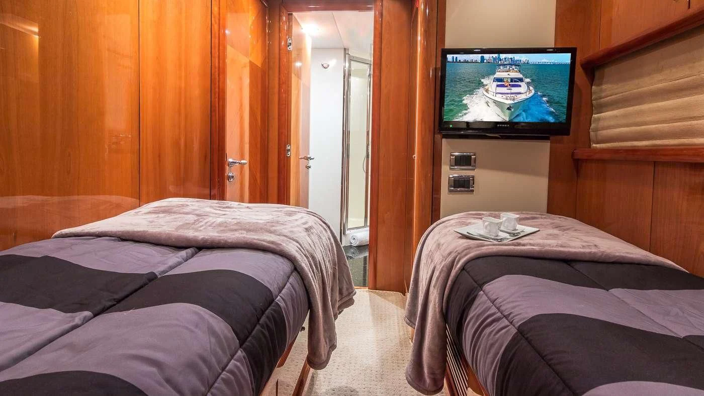 a hotel room with a tv aboard SS ARTS Yacht for Sale
