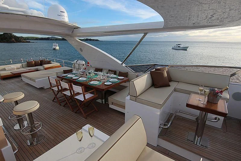 a room with a table and chairs aboard ESTEL OF IBIZA Yacht for Sale