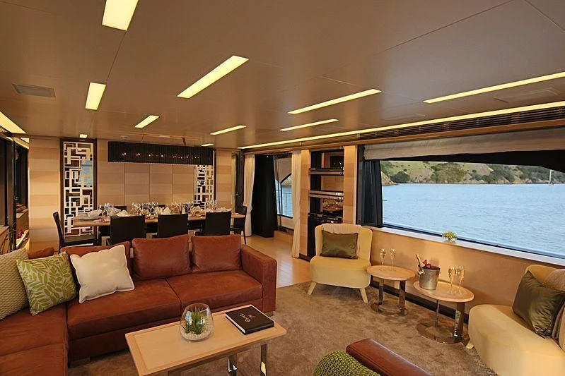 a living room with a large window aboard ESTEL OF IBIZA Yacht for Sale