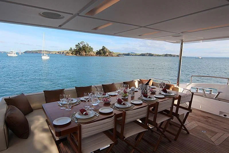 a table set for a meal on a boat aboard ESTEL OF IBIZA Yacht for Sale
