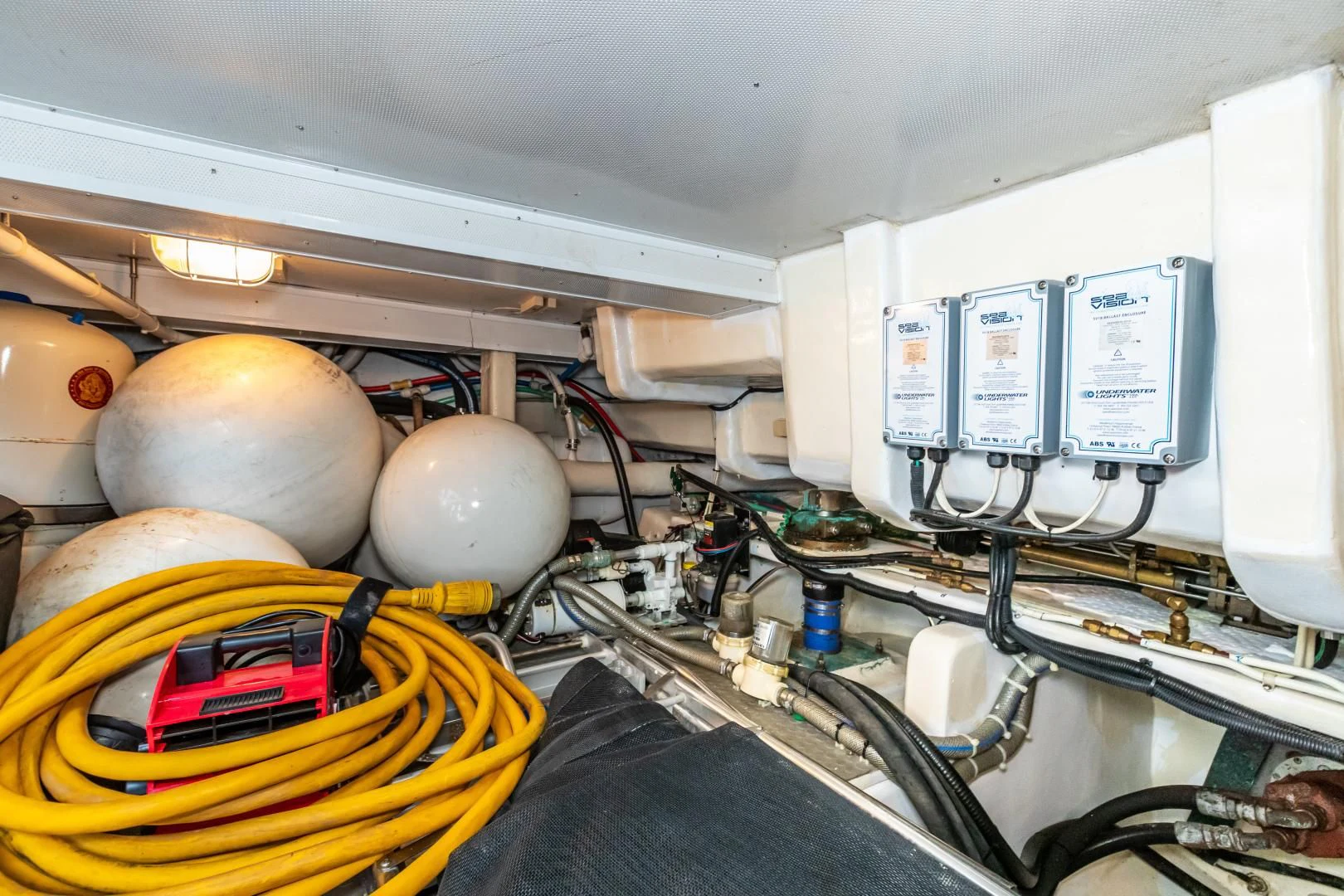 a machine with a large white object on the side aboard TJ SQUARED Yacht for Sale