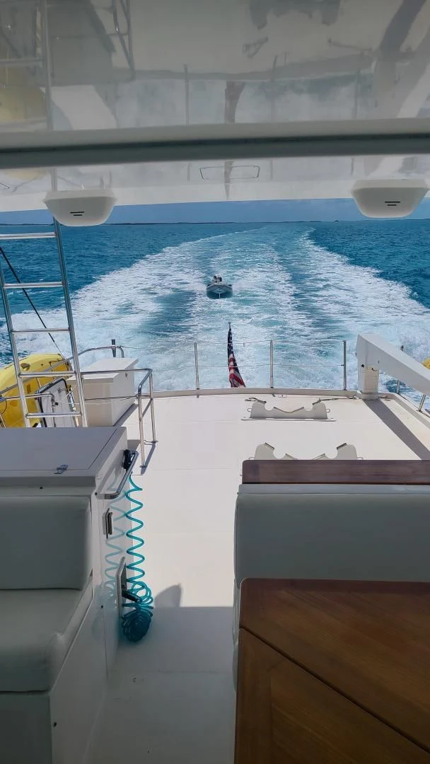 a boat on the water aboard TJ SQUARED Yacht for Sale