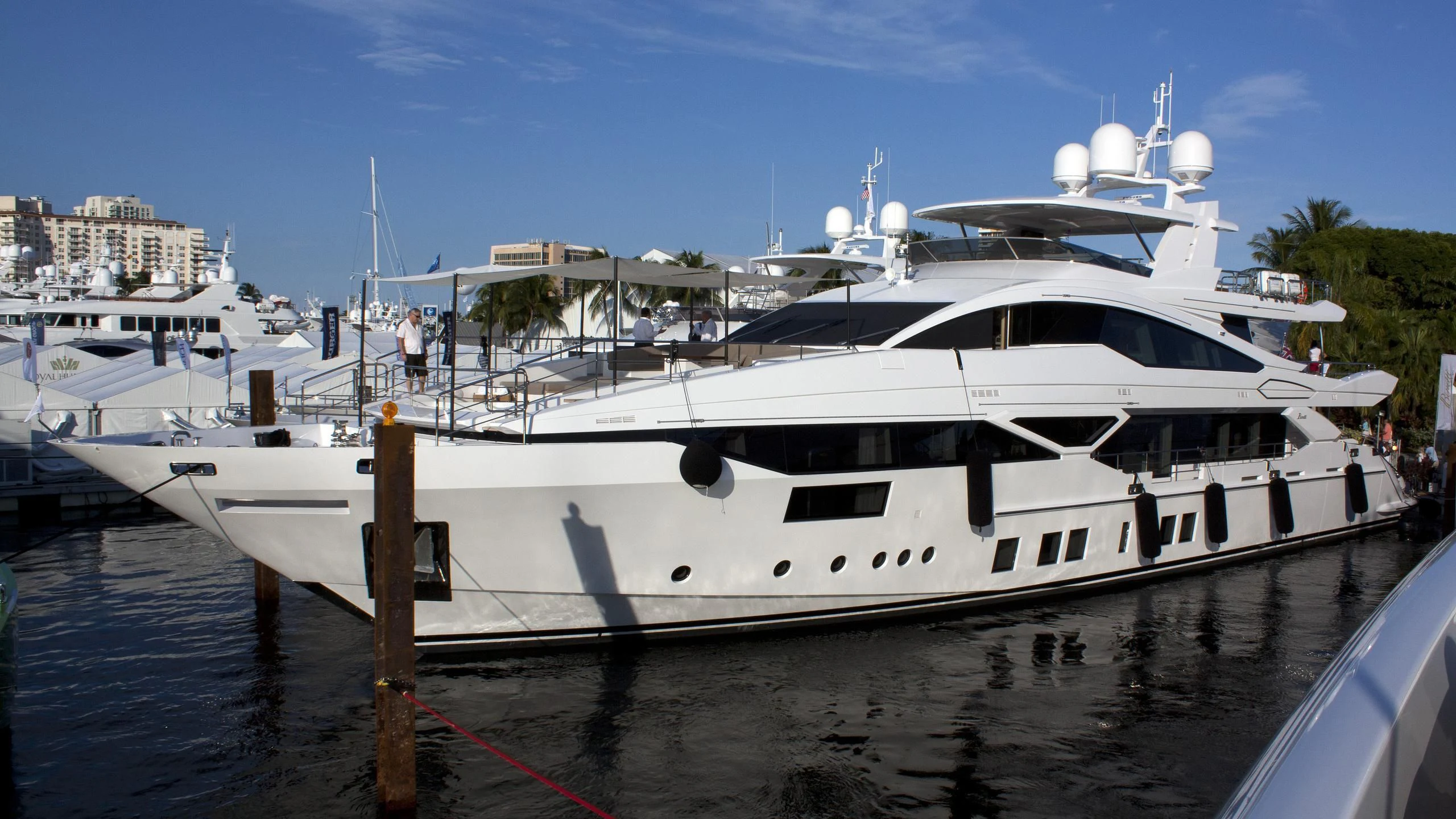 a white yacht docked aboard EMINA Yacht for Charter