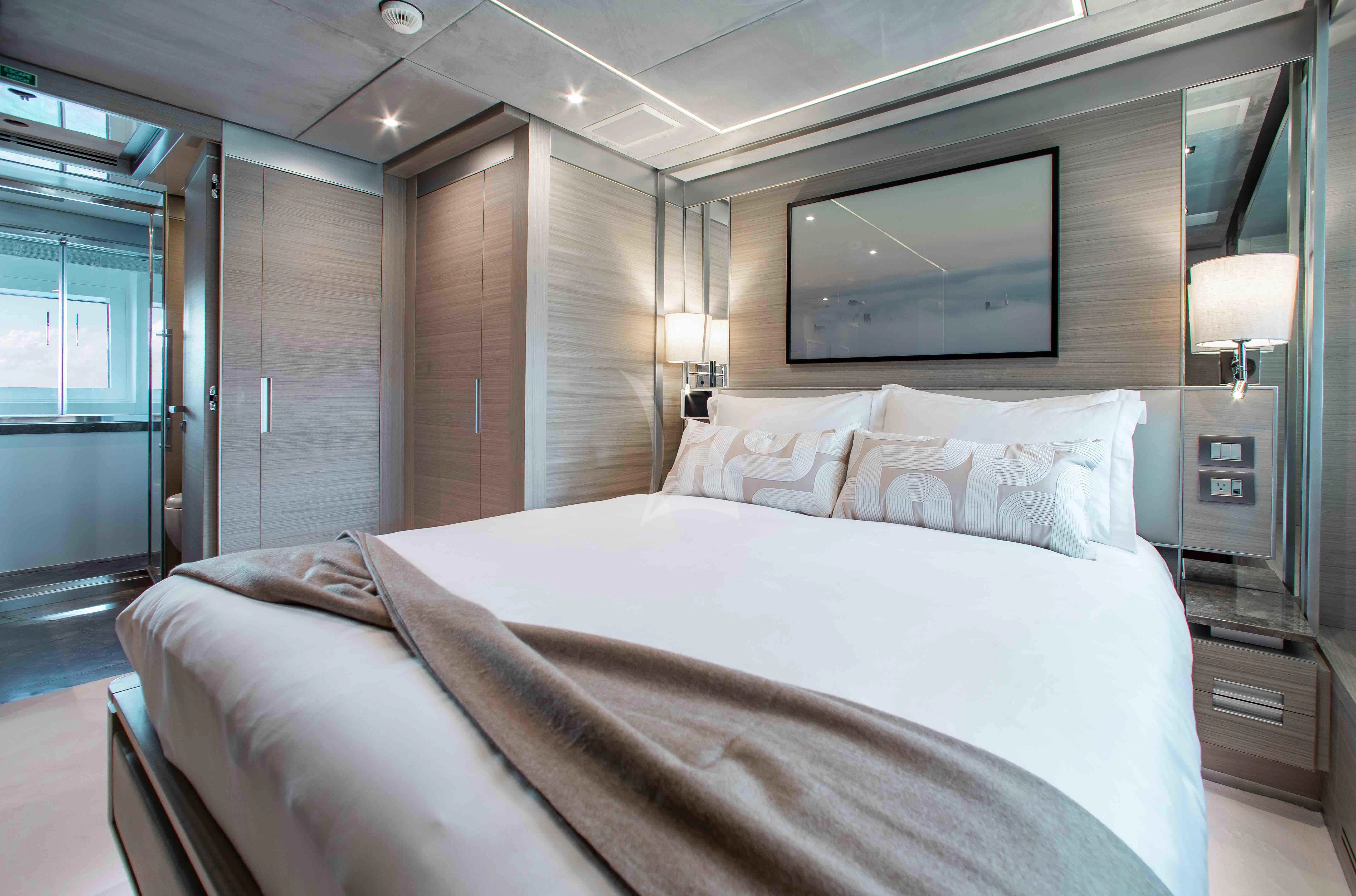 a bed in a room aboard EMINA Yacht for Charter
