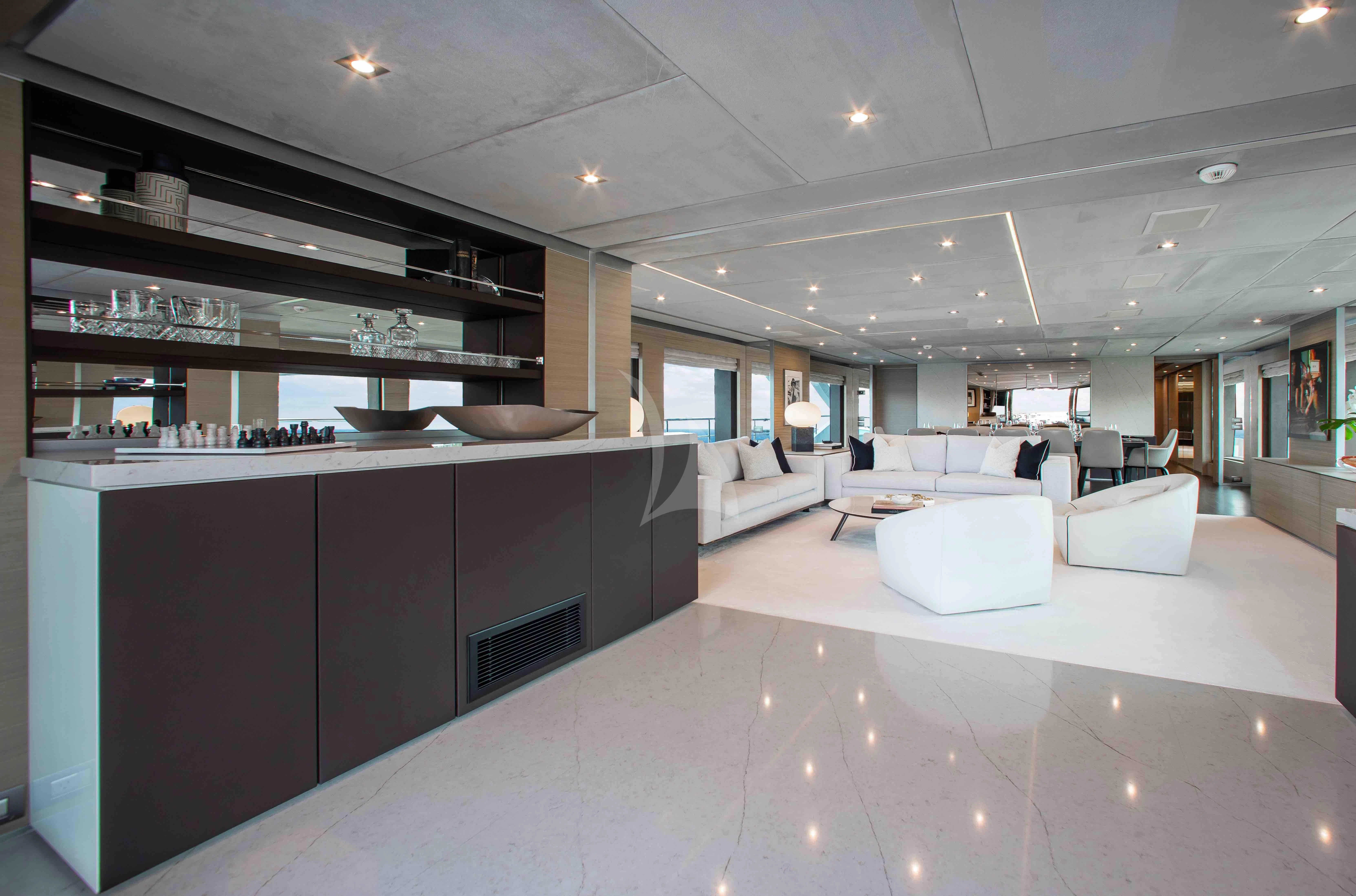 a large kitchen with white furniture aboard EMINA Yacht for Charter